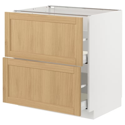 Wooden kitchen cabinet with two drawers, light wood color, rectangular, framed design.