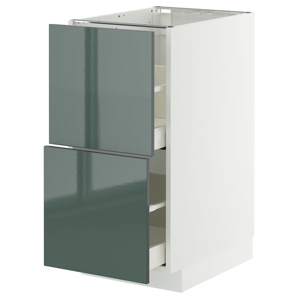 Modern grey-green high-gloss cabinet, part of ikeas METOD kitchen system.