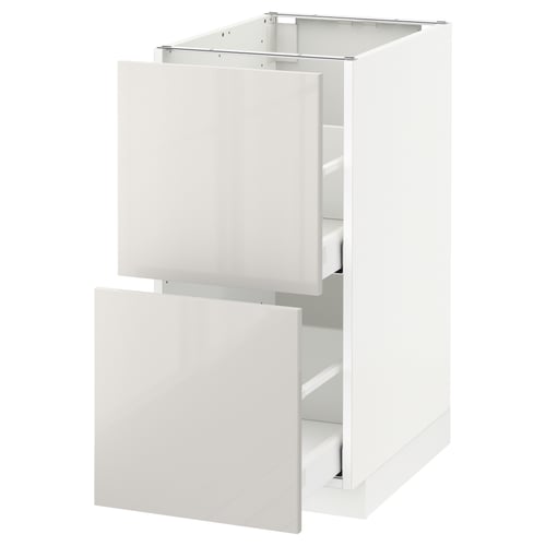 METOD kitchen cabinet, white, glossy finish, rectangular shape, with open drawers.
