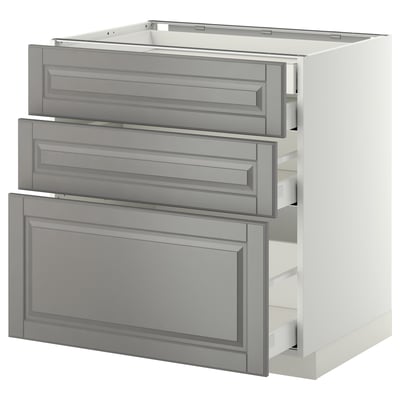 This image shows a grey METOD kitchen cabinet with three drawers, designed in a classic style with a smooth, soft-close feature.