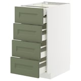 A white METOD kitchen cabinet with four green drawers, each with a rectangular handle. The drawers are arranged vertically, providing storage space.