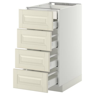 A white METOD kitchen unit with four off-white bevelled drawers, offering a traditional and warm design.