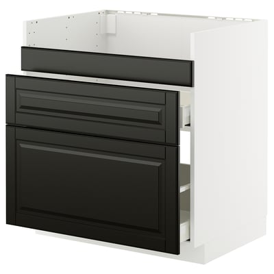 Black and white kitchen unit with drawer and shelves. Made of particleboard and metal. Part of the METOD series.