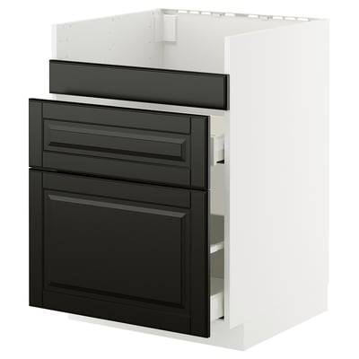 Black and white kitchen unit with drawers and shelves. Sleek, modern design.