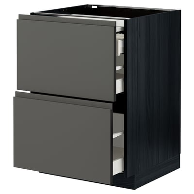 Modern dark gray kitchen cabinet with smooth drawers, sleek design, and integrated handles.