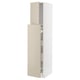 A beige ceton high cabinet with a smooth finish and integrated storage compartments, part of the METOD kitchen system.