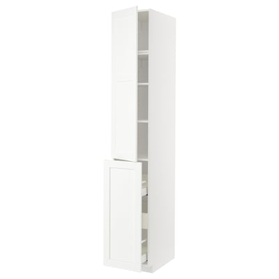 White METOD cabinet with pull-out shelf and drawer, sleek modern design.