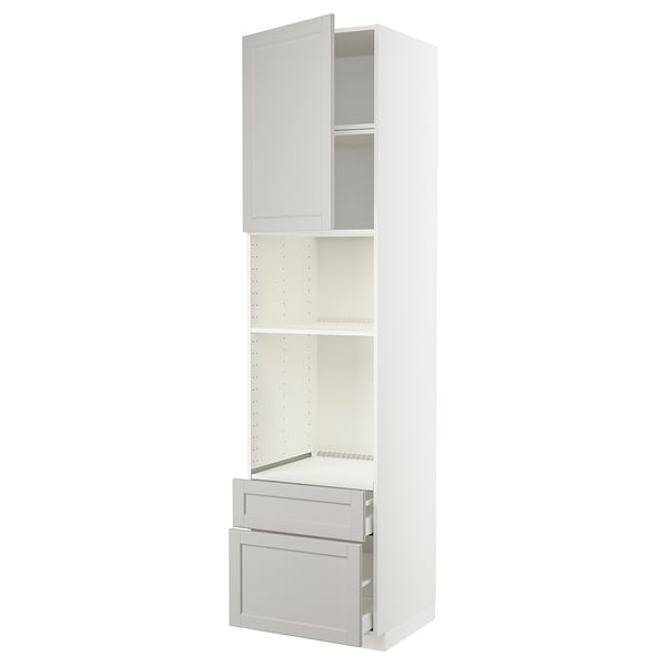A white METOD kitchen unit with both drawers and shelves. It a classic design with light grey lerhyttan fronts.