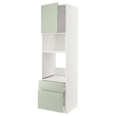 Modern tall kitchen unit with green-painted doors and shelves, white frame, and stainless steel drawers.