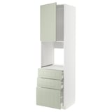 A tall METOD kitchen cabinet with green stensund fronts, featuring multiple drawers and a shelf.