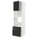 A METOD kitchen cabinet with black handles. It an exposed look, white frame, and adjustable shelves.