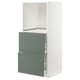 A white METOD kitchen cabinet with grey-green drawers. Its modern, with smooth-running drawers.