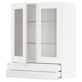 A white METOD kitchen cabinet with glass doors and drawers.