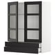 Modern black & white kitchen unit, METOD. Glass doors with wooden frame, adjustable shelves, sleek design.