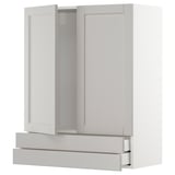 White METOD kitchen cabinet with pull-out drawers and two doors.