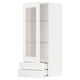 A white METOD kitchen cabinet with glass doors and drawers. It has a classic look with a sturdy frame and smooth-running drawers.