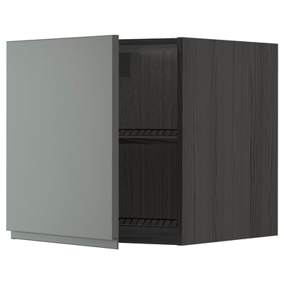 A modern dark grey METOD kitchen cabinet with one open door, exposing internal shelves.