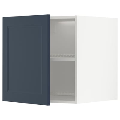 Image shows open blue METOD kitchen cabinet with two shelves.