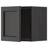 Dark grey kitchen cabinet with one door open, showcasing interior. Made of wood and modern style.