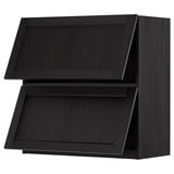 Black kitchen cabinet with beveled edges, sleek and modern design.