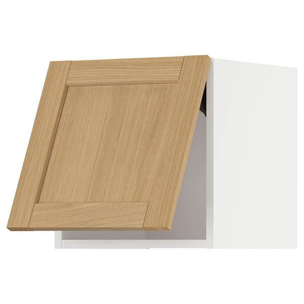 A light wood-colored kitchen cabinet with a light gray interior.
