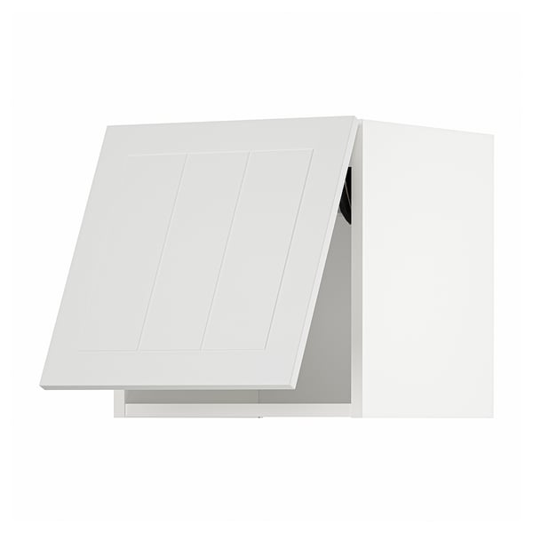 White kitchen cabinet with angled door, sleek modern design.