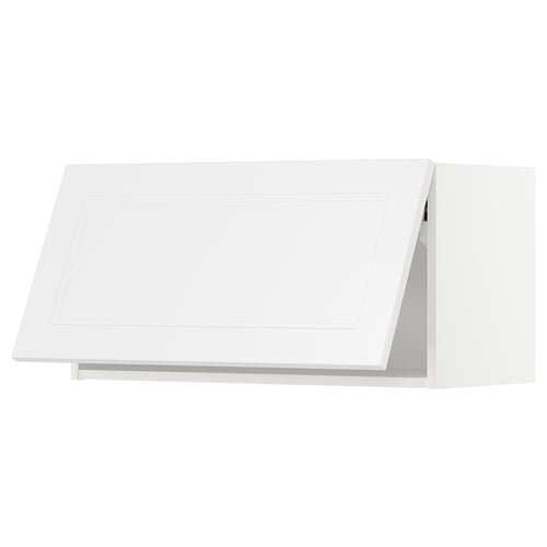 White METOD kitchen cabinet with angled design, sleek modern look.