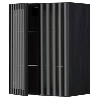 Modern black METOD kitchen cabinet with reeded glass doors and sleek metal frame.