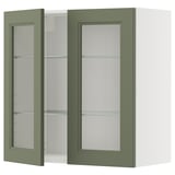 Elegant green wall-mounted cabinet with glass doors, sleek design, and adjustable shelves. Perfect for modern kitchens.