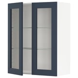 METOD kitchen cabinet with blue glass doors and white frame, square shape.