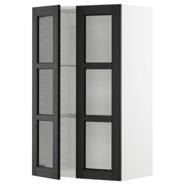 Black & white METOD kitchen cabinet with glass doors and beveled edges.