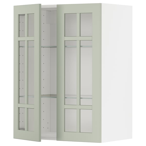 Green METOD kitchen cabinet with glass doors and adjustable shelves.