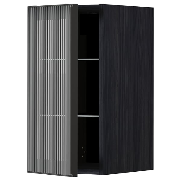Black METOD kitchen cabinet with vertical ribbed glass door & shelf