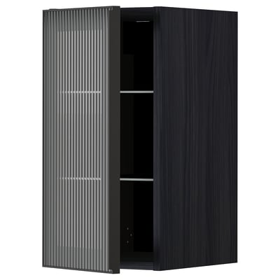 Black METOD kitchen cabinet with vertical ribbed glass door & shelf