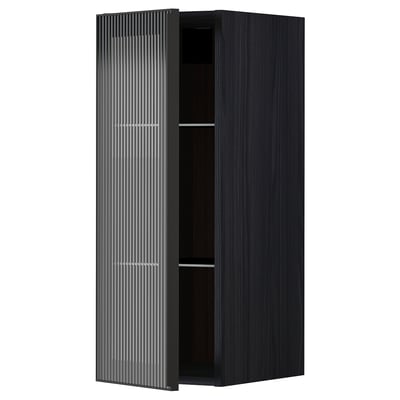 Modern black kitchen cabinet with a single reeded glass door and sleek metal frame, standing upright with a minimalist design.