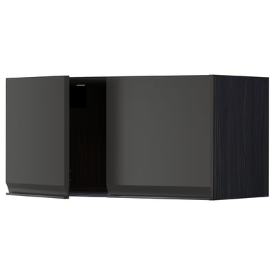 A modern black wall-mounted cabinet from ikeas METOD kitchen system, featuring sleek edges and a minimalist handle.
