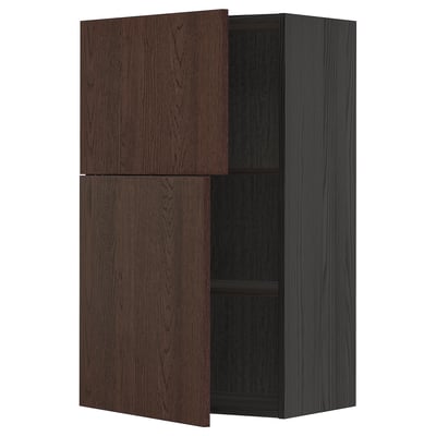 A dark brown METOD wall cabinet with a wooden texture and a square shape. It two adjustable shelves, one open door, and two closed doors.