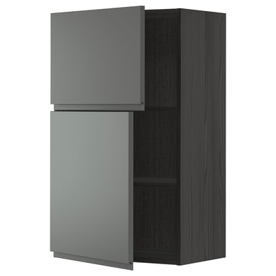 Modern gray kitchen cabinet with dark wood finish and integrated handles.