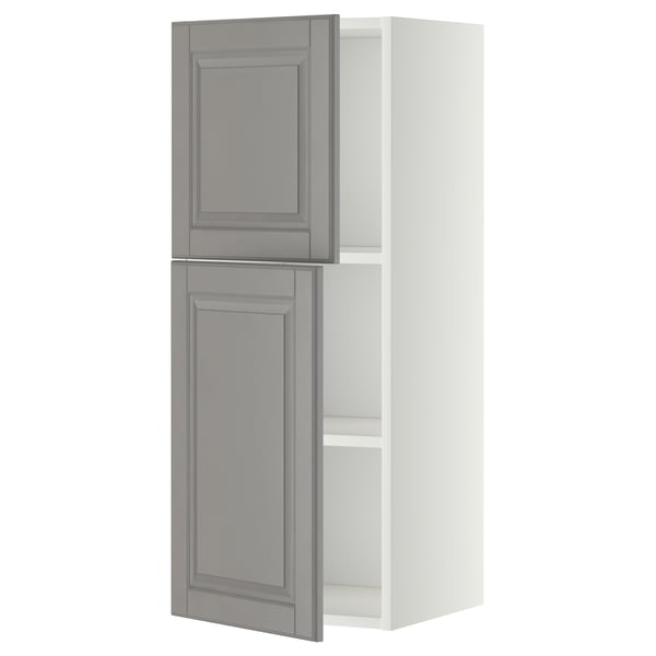 METOD kitchen unit in soft grey with bevelled edges. Wall-mounted, two-door cabinet with adjustable shelf.