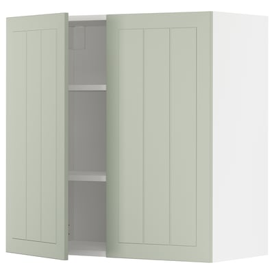 Green METOD kitchen unit with adjustable shelf, light wood grain design.