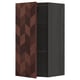 A brown herringbone-patterned kitchen cabinet with a dark frame, featuring a single shelf inside.