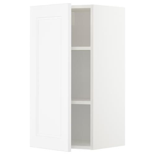 A white METOD wall cabinet with a rectangular design and adjustable shelves.
