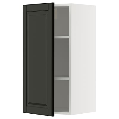 Black & white kitchen cabinet. Open door reveals shelf inside.