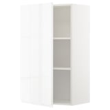 A white METOD wall cabinet with two shelves and a reversible door.