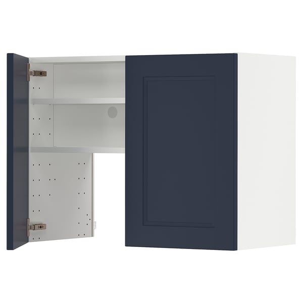 Blue METOD kitchen cabinet with white interior, open door, adjustable shelf.