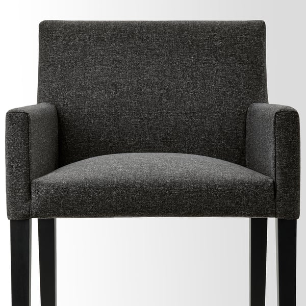 Modern upholstered chair with dark gray fabric, square backrest, cushioned seat, armrests, sturdy wooden legs.