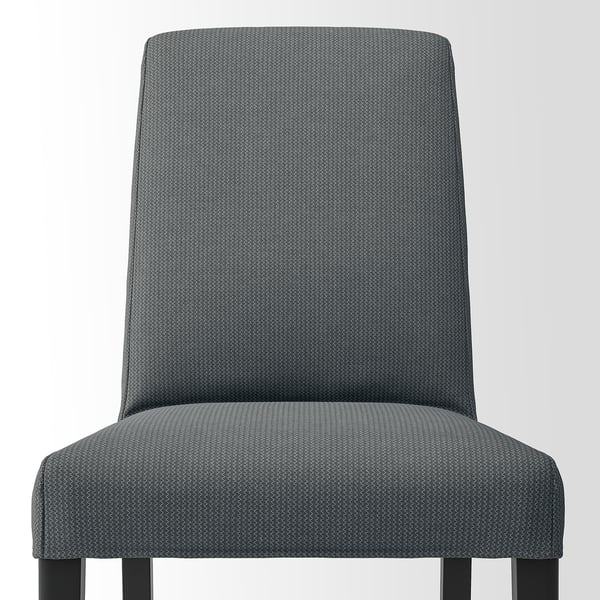 Comfortable grey chair with wood legs.