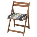Brown wood folding chair with striped green, grey, and white cushion, suitable for outdoor use.
