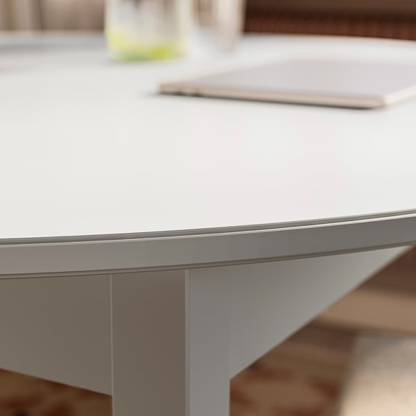 Close-up of modern table edge, sleek design with smooth surface.