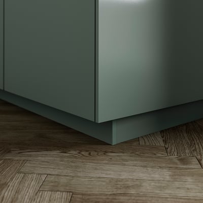 Decorative kitchen plinth, grey-green, fills gap between floor and base cabinets.